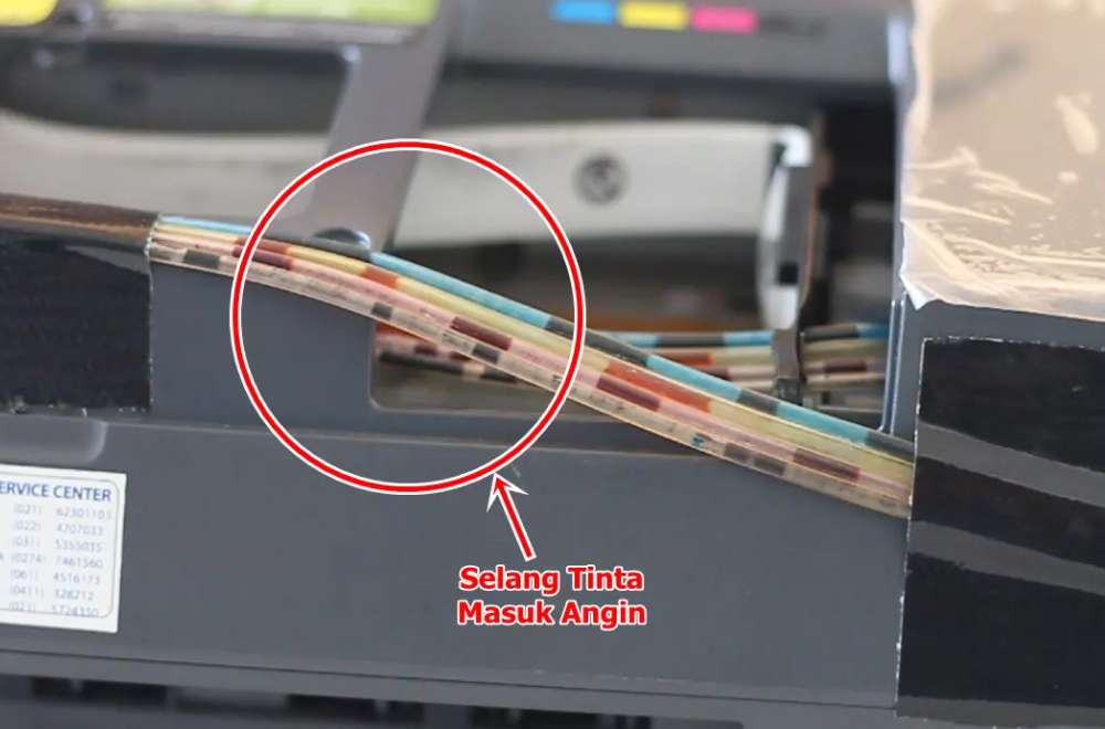 Selang Tinta Printer Dtf Yang Terlihat Ada Gelembung Udara Di Dalamnya, Ditandai Dengan Lingkaran Merah