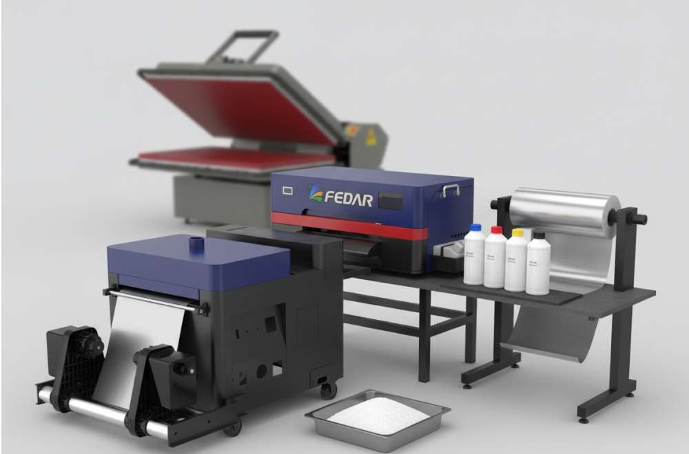 Peralatan Sablon Dtf Lengkap Terdiri Dari Printer, Tinta Khusus, Film Pet, Bubuk Perekat, Dan Mesin Heat Press.